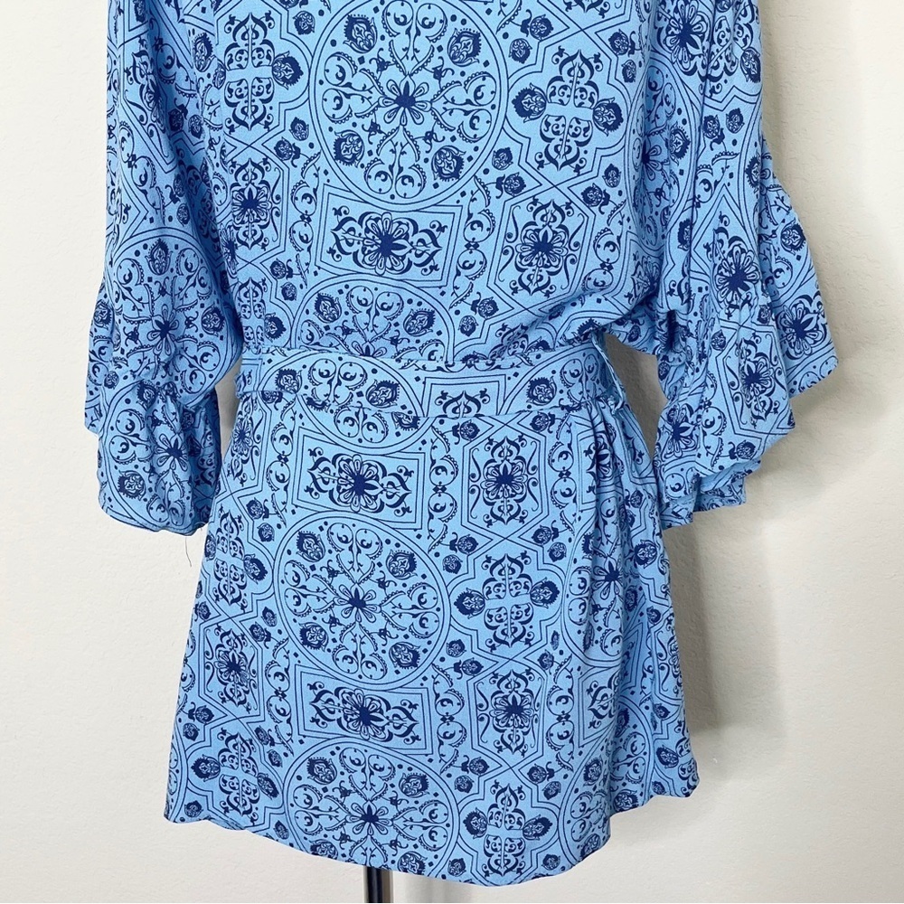 Ruby Ribbon Ruffle Wrap Blue Floral Top - Picture 10 of 13